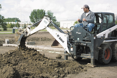 Turn your Bobcat? loader into a powerful excavator with a full line of back...